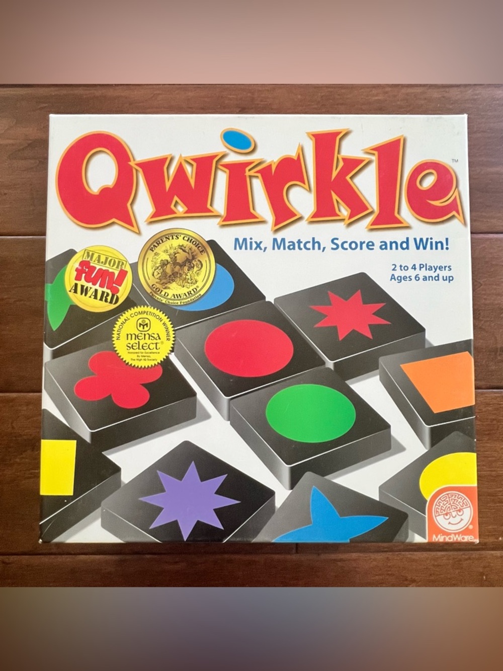 Qwirkle Board Game - Colorful Shape Matching